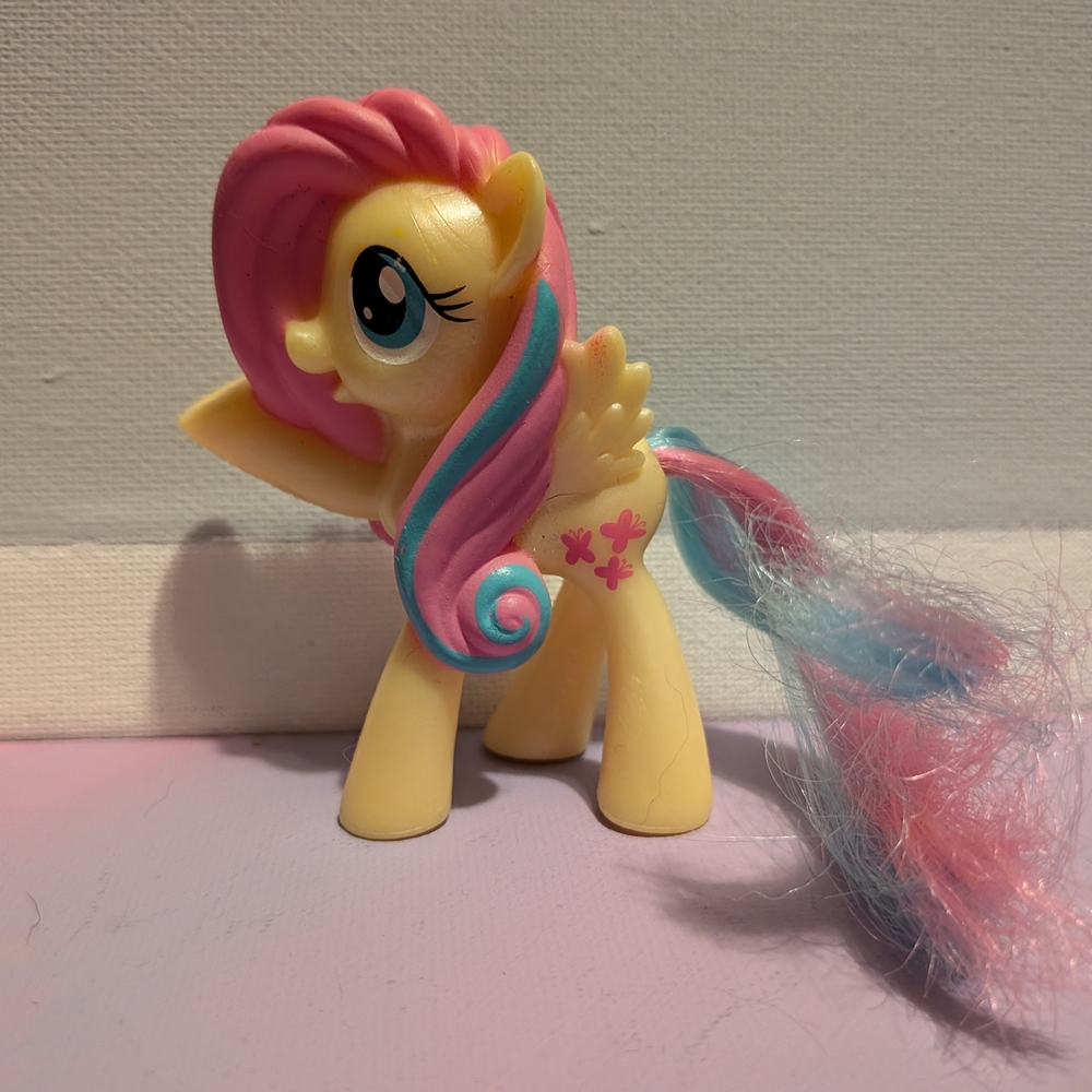 Colorful Pony Figurine with Pink and Blue Mane